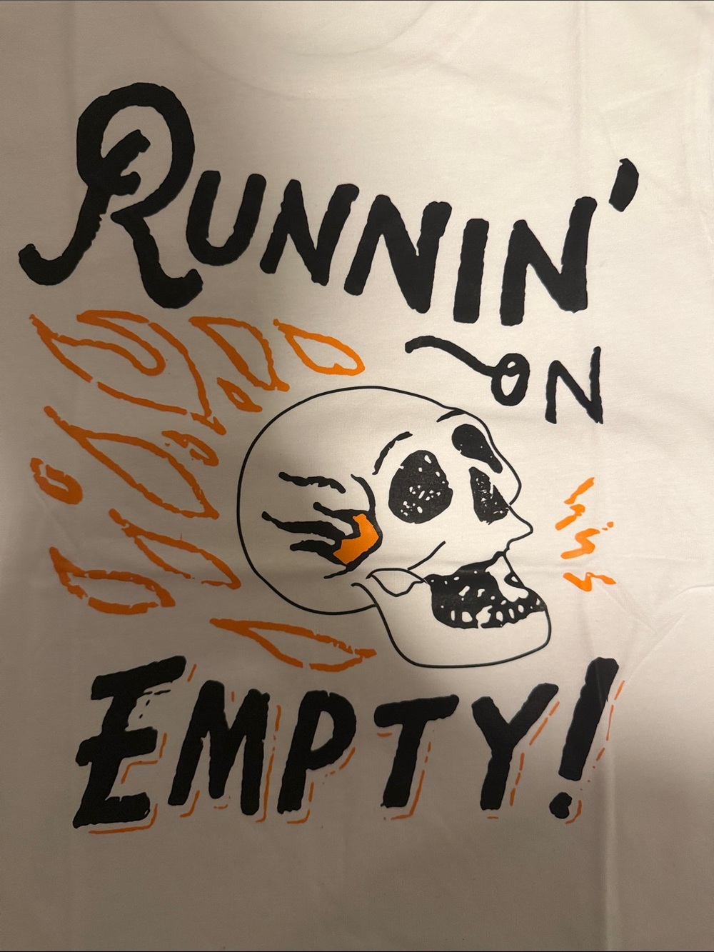 White Graphic Short Sleeve Tee with 'Runnin on Empty’ and Skull with flames